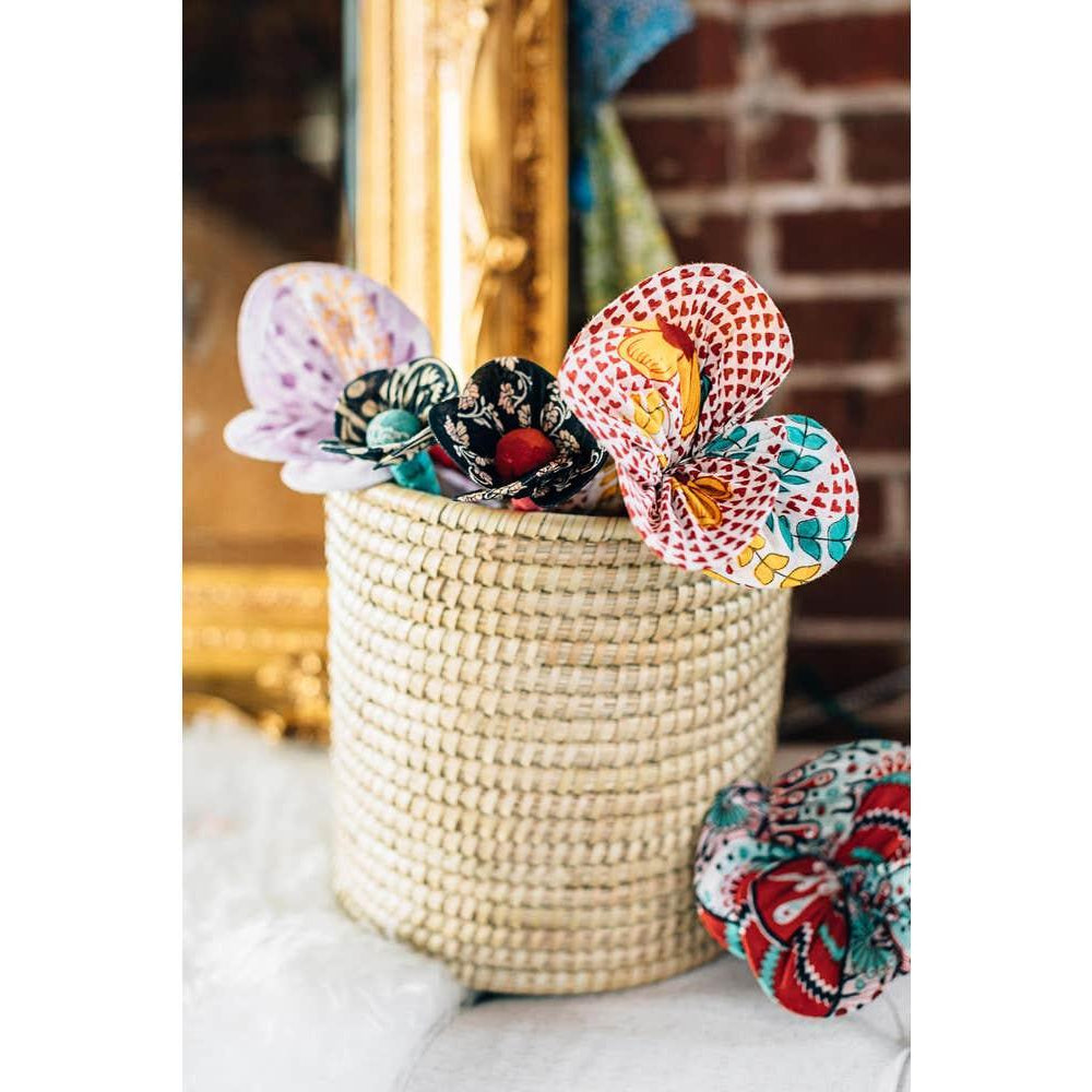 Recycled sari flowers in a woven basket