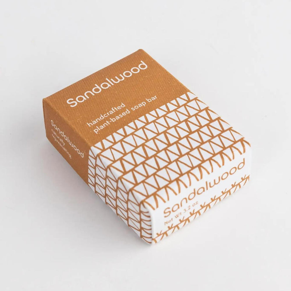 Sandalwood soap on a white background in a brown and white box