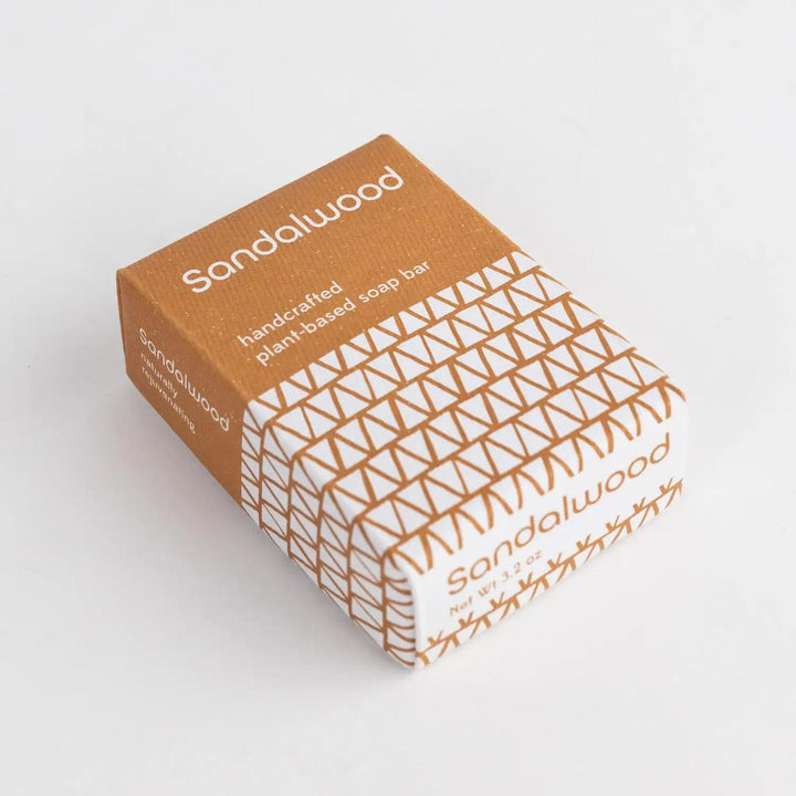 Sandalwood soap on a white background in a brown and white box