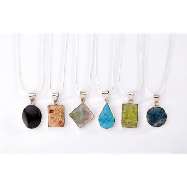 a collection of semi precious stone necklaces