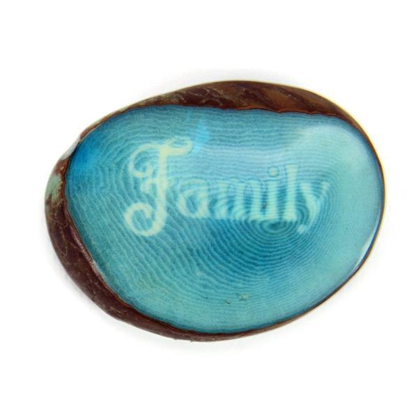 aqua tagua nut with the word 'family'