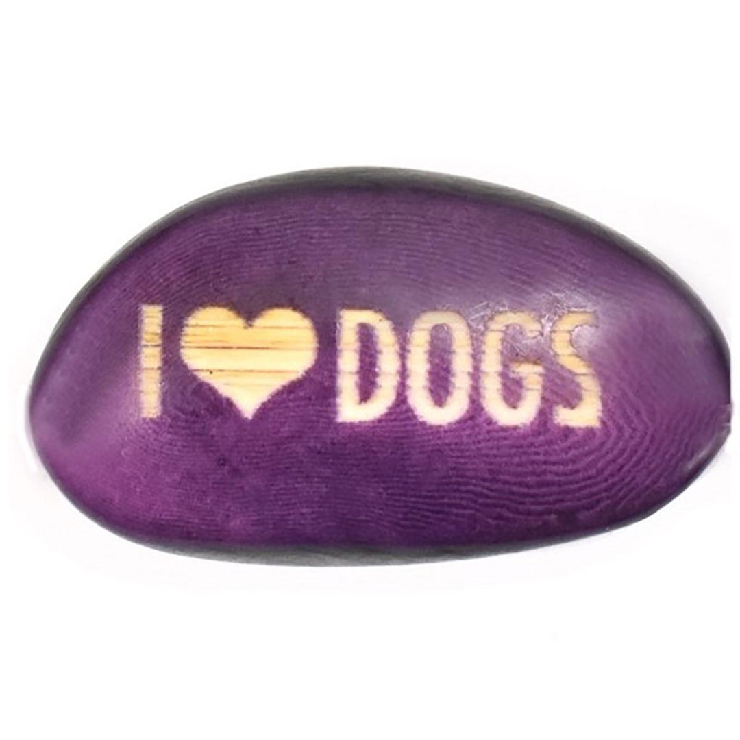 a purple tagua nut with 'i heart dogs'