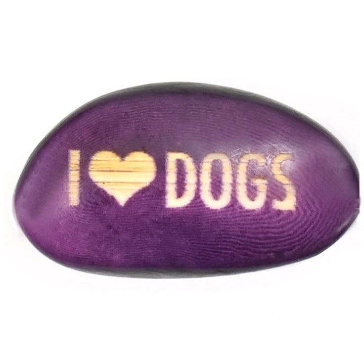 a purple tagua nut with 'i heart dogs'