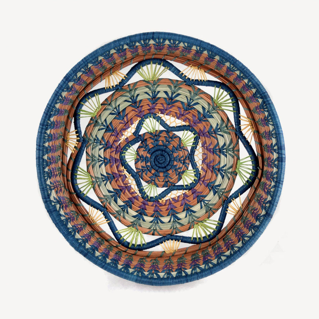 Handmade woven multicolor basket with colorful patterns.