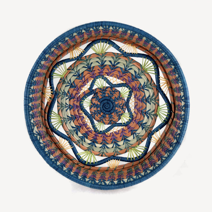Handmade woven multicolor basket with colorful patterns.