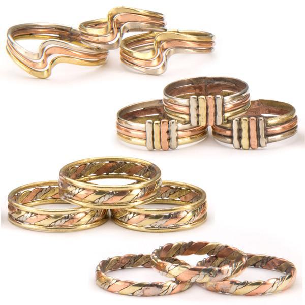 A collection of three different metal rings, with color variations such as gold and silver, showcasing various designs.