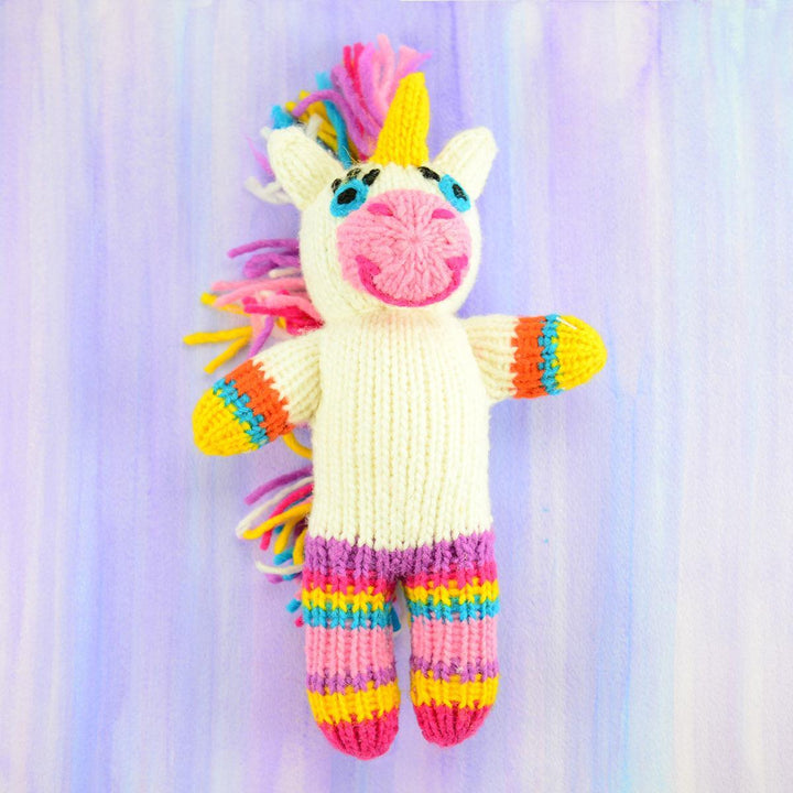 A handmade wool doll depicting a unicorn with a colorful mane and tail.