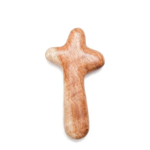 a wooden cross on a white background